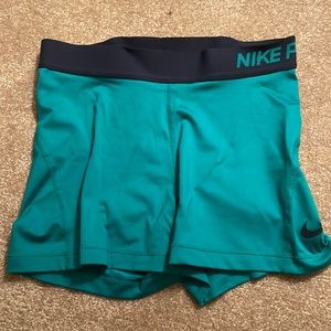 MEDIUM nike pros two tone teal and navy